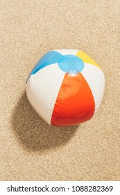 Top View Of Colorful Beach Ball On Sand