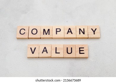 Top view of Company Value word on wooden cube letter block on white background. Business concept