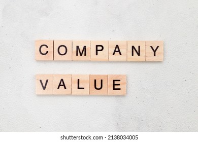 Top view of Company Value word on wooden cube letter block on white background. Business concept