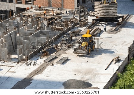 Top view of construction site during concreting of basement stairs