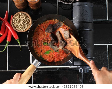 Top View Cooking Process Making Oseng Pedas Paru (Balado Paru), Dishes Made from Beef Lungs Cooked Spicy Typical Food from Indonesia