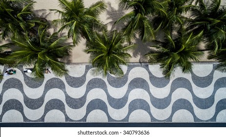 Top View of Copacabana beach with mosaic of sidewalk in Rio de Janeiro. Brazil - Shutterstock ID 340793636