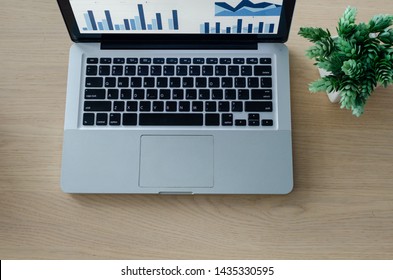 Top view with copy space. computer laptop on table and flower