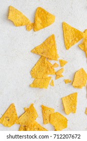 Top view of corn chips on white
