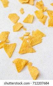Top view of corn chips on white
