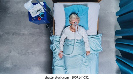 Top View Of Covid-19 Patient With Oxygen Mask In Bed In Hospital, Coronavirus Concept.