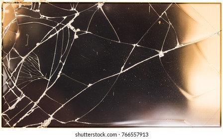 Top view cracked broken mobile screen glass texture vintage background.