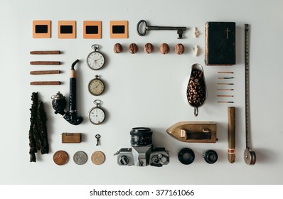 Top view of creative arrangement of vintage travel things on desk