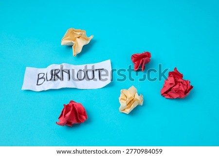 Top View Of Creative Block Visualized With Crumpled Paper Wads And Frustration Message Depicting Mental Exhaustion