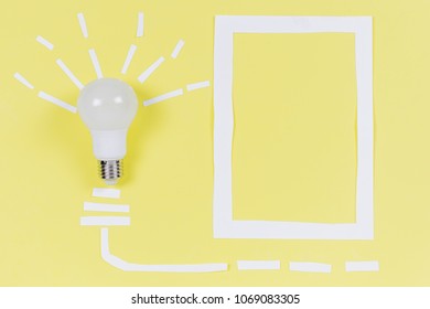 Top view of creativity inspiration, white Light bulb on yellow pastel background. minimal concept. ideas concepts with lightbulb and paper. Flat lay design. Electric wire. Creative framework