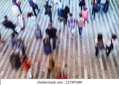 Top View Of A Crowd Of Commuters In Motion Blur