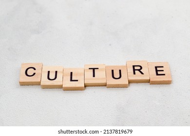 Top view of Culture word on wooden cube letter block on white background. Business concept
