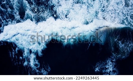 Top view dark blue sea water wave Big wave in black sea Top-down form aerial view Drone high quality camera.