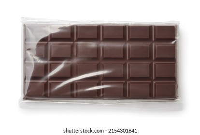 Top view of dark chocolate in transparent plastic packaging isolated on white - Shutterstock ID 2154301641