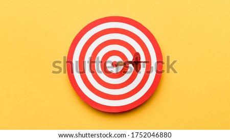Top view dartboard with arrow in center