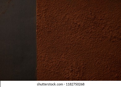 top view of delicious brown cocoa powder on black background 