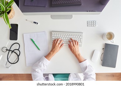 Top View Of A Desk Of A Female Doctor