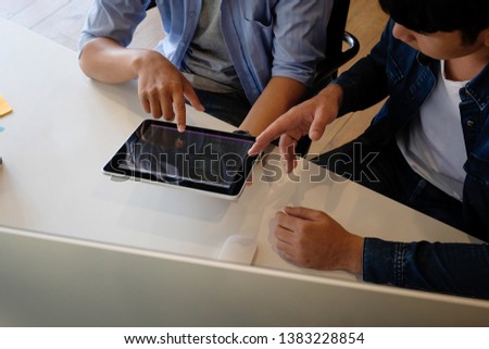 Top view development team working with UX UI responsive design.