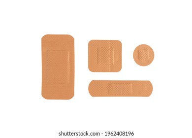 Top view different medical plaster isolated on a white background. Medical sticking patch isolated on white. First aid item. Adhesive bandage plaster