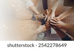 Top view of diverse group of hands stack, coming together for business teamwork. This image symbolizes teamwork, collaboration, and community spirit. This image emphasizes business teamwork.