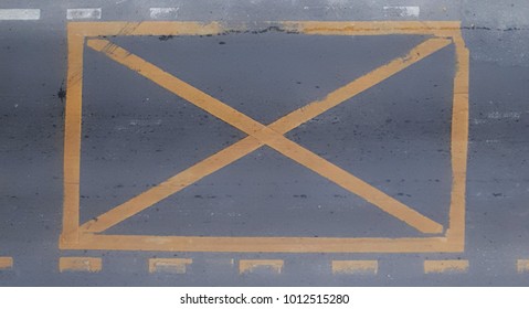Top view of Do not stop sign on the road.