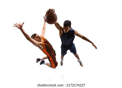 Top view dynamic shot of two professional basketball players in motion, in a jump, training isolated over white studio background. Concept of sport, team game, action, active lifestyle, ad - Powered by Shutterstock
