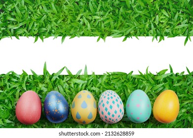 Top view easter eggs painted is on real green grass with white area for text space easter background concept