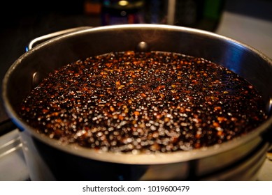 Top View Of Elderberry Syrup On The Stove Top