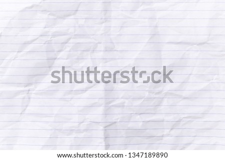 Top view empty lined paper with wrinkled background and texture.