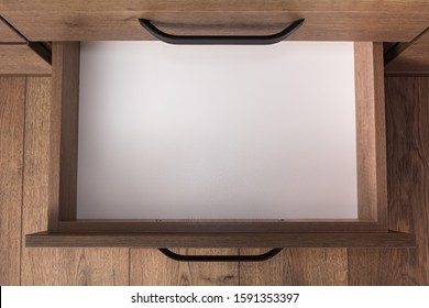 Top View Of Empty Open Wooden Drawer