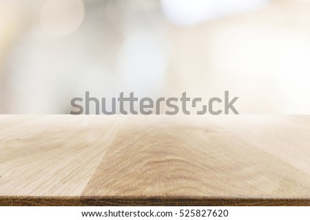 Top view of the empty wooden table on abstract background for your decoration, display or editing product.