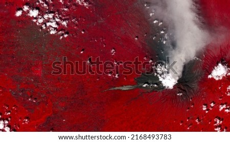 Top view of eruption at Mount Merapi, Indonesia, Hot volcanic avalanches from Merapi Volcano, Pyroclastic flow,Gendol River, Red vegetation landscape,Gray ash. Elements of this image furnished by NASA