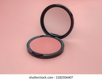 Top view eye shadow, blush, powder, sculptor in case pink isolated background place for text. aesthetics of makeup artist, make-up, make-up for yourself, beauty, salon