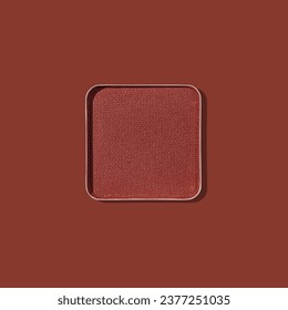 Top view eye shadow intense rust swatch with shadow on gray background, minimal style photo, compact eyeshadow, colored powder for festive makeup, square shape metal pack, beauty cosmetics trend color