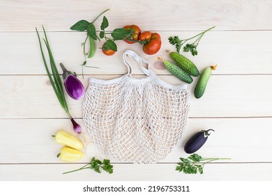 Top View Fabric Natural Reusable Grocery Bag And Different Vegetables On A Wooden Background, Zero West Concept, Harvesting