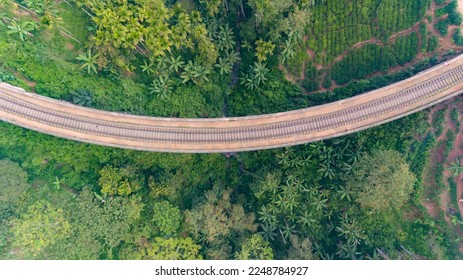 Top view of famous Nine Arches Bridge of Sri Lankan railway. A viaduct bridge located Demodara, between Ella and Demodara railway stations.  - Powered by Shutterstock