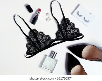 Top view fashion black lace lingerie. Set of woman essential accessory and underwear on flat lay.
