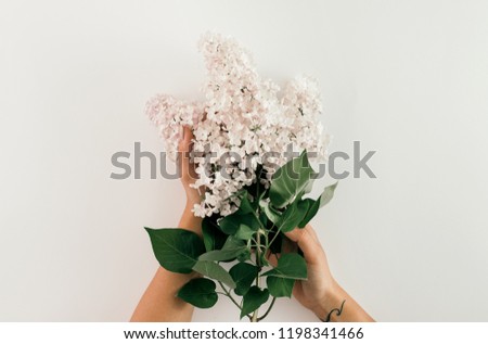 Similar – Hände einer Frau mit Blumenstrauß