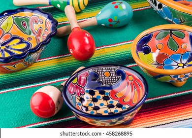 Top View Of Fiesta Table Decorated With Colorful  Letters, Maracas, Bright Pottery.