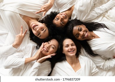 Top View Five Diverse Women In White Bathrobes Lying In Bed Smile Look At Camera Feels Happy After Body Treatment, Day Spa Procedures, Resort Beauty Salon Satisfied Clients, Bachelorette Party Concept