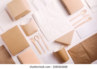 Top View And Flat Lay Concept Of Food Kraft Paper Packaging For Food Delivery. Paper Food Boxes From Eco Friendly Materials On White Background