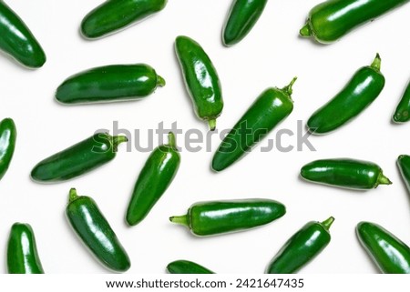 top view flat lay green jalapeno chili pepper isolated on white background. pile of green jalapeno chili pepper isolated. heap of green jalapeno chili pepper white isolated