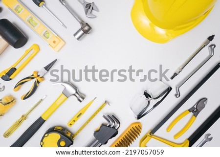 Top view flat lay set construction toolkit  safety protect industrial equipment gear on white background with empty space for craft diy build renovation,service maintenance repair in workshop concept.