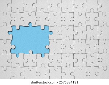 Top view flat lay of white jigsaw puzzle game texture incomplete or missing piece on a yellow, blue and orange background.