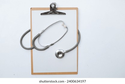 Top view and flat lay,copy space doctors office desk. Medical accessories  isolate on a white background - Powered by Shutterstock