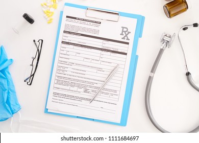 Top View Flatlay Of Doctors Tools On White Desk Composition Of Patients Form On  Clipboard, Glasses And Stethoscope, Copy Space