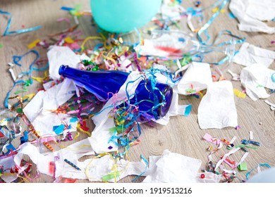 Top View Of Floor With After A Party Celebration With Empty Blue Bottles, Wine Glass And Party Decorations, Messy Living Room Interior, After Party Chaos, Birthday