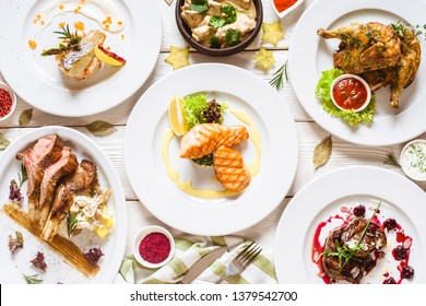 Top View Of Food Assortment. Luxury Buffet Flat Lay. Selection Of Plates And Dishes On White Background