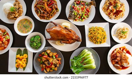 Top View Food Platter Combo Set Of Traditional Cantonese Yum-cha Asian Gourmet Cuisine Meal Food Dish On The White Serving Plate On The Table, Includes Dishes Of Duck, Pork, Fish, Chicken, Vegetables