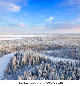 Top view of forest river in winter